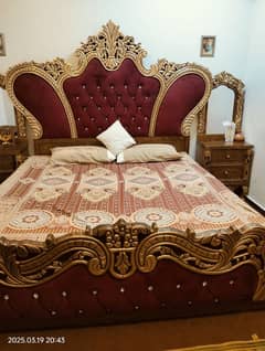 king size merron cussion bed ,two mirror side tables ,dressing table.