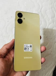 samsung A06 golden colour 4/64 with box