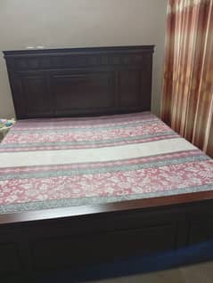 Slightly used king size Wooden polished bed set