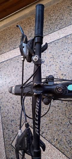 (new tyres)(new disc brakes)(eight gears)