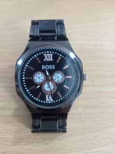 It's Black boss watch for men's and boys very attractive watch