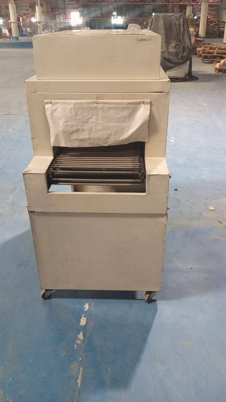 PET Packaging machine complete with Heat Shrink Tunnel 2