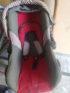 baby carry cot and car seat