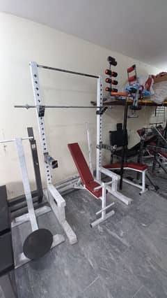 Squat rack cable cross over function trainer smith leg press dips bar