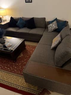 Elegant L-Shaped Grey Sofa with Wooden Sides - Excellent Condition