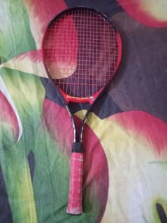 Red color tennis Racket