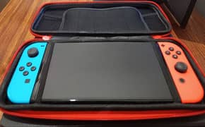 Nintendo Switch OLED (includes games)