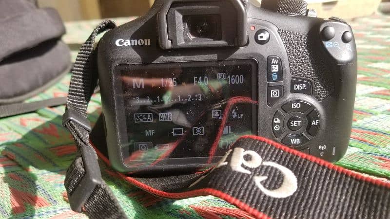 Canon 1300d 18-55mm lens plus 32 GB Card plus Camera Bag 10