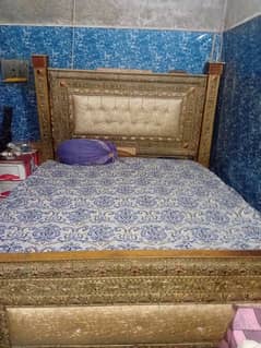 wooden double bed