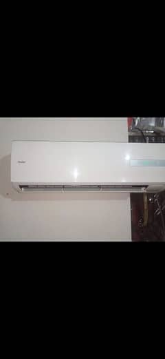 new condition haier ac 1 ton  with out door with 15 foot pipe