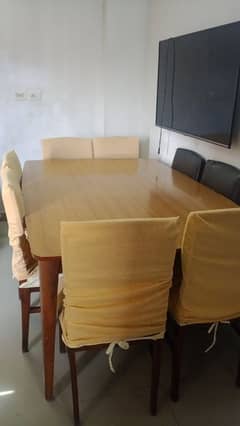 dinning table with eight chairs