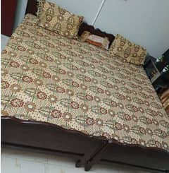 very good condition wooden bed with mattress