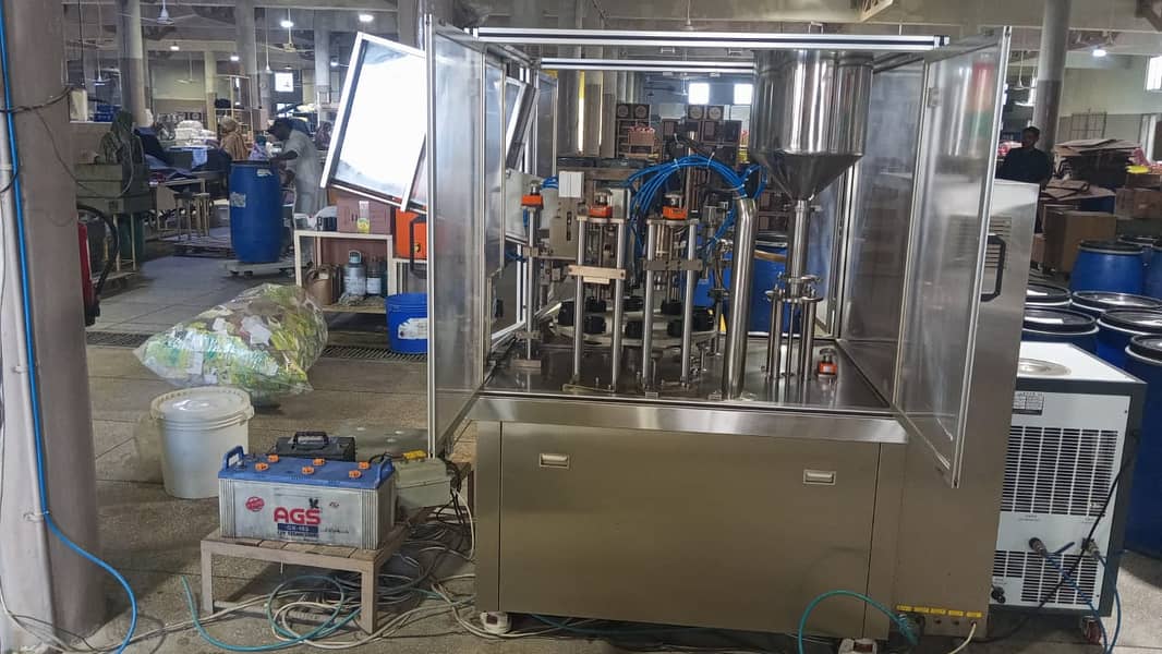Automatic Soft Tube Liquid /Paste Filling, Sealing, & Cutting machine 2