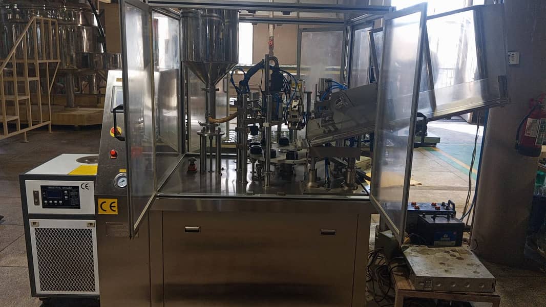 Automatic Soft Tube Liquid /Paste Filling, Sealing, & Cutting machine 5