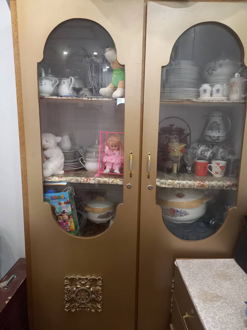 Wooden wardrobe with Glass Doors in very good condition. . . . 1