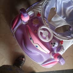 baby 2 in walker/rocking chair for sale only 1 month used