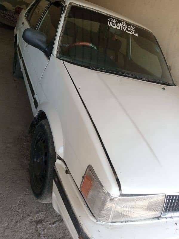 Beautiful 86 Corolla 95 clear. white colour,intehai munasib price me , 1