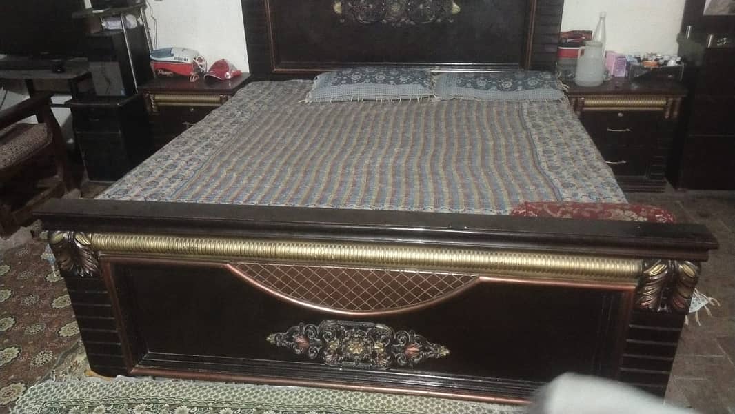 Beds along with sidetables 0