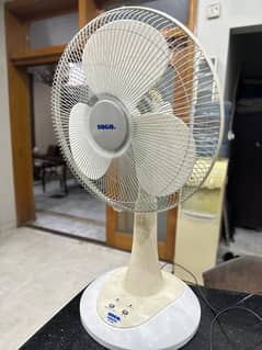 SOGO table Fan , with charging facility .