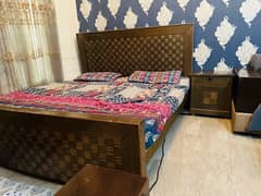 Few years used bed with mattress and side tables