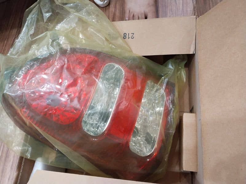 Alto back lights (Genuine, Brand New) 0