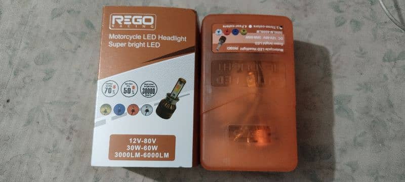 Honda Front bike light led Bulb only 4 days use 3 colours in one bulb 1