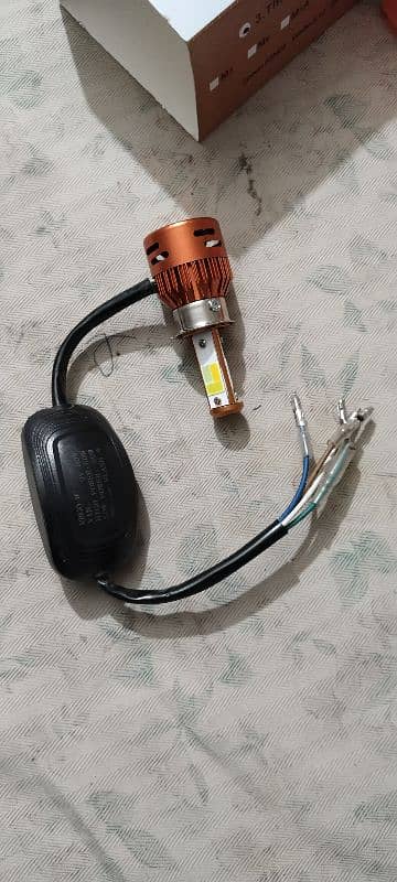 Honda Front bike light led Bulb only 4 days use 3 colours in one bulb 3