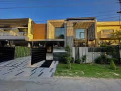 1 Kanal Brand New Ultra Modern Design House For Sale With Double Height Lobby & Swimming Pool .