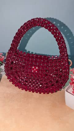 Fiery Beats: Handcrafted Red Semicircle Handbag for the Fashionista