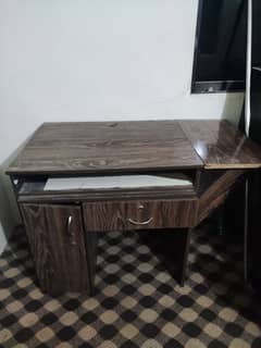 Customized computer table with storage.