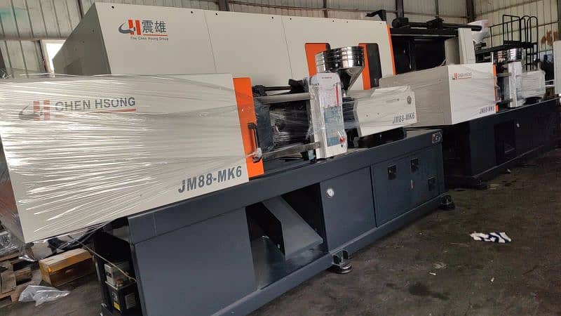 injection moulding machine 12