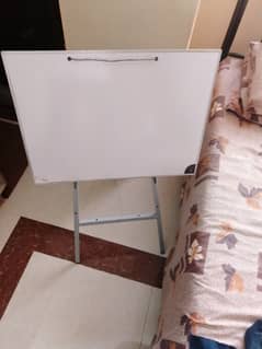 black and white board with stand