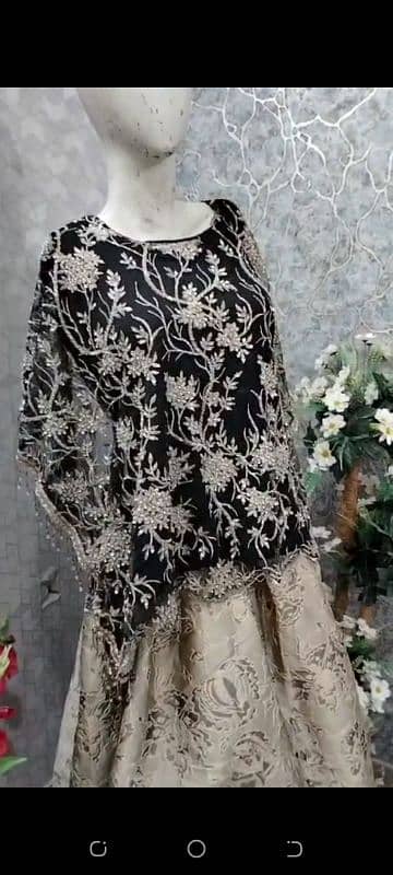 embroidery skirt with net heavy work top with bagi style 2