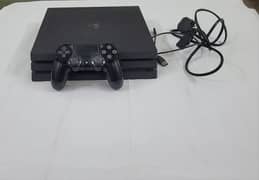 PS4 Pro 1TB – Excellent Condition + Accessories