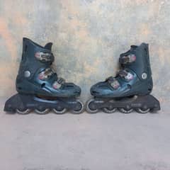 Adjustable Skating Shoes | 4 wheels | Nice conditon | Imported