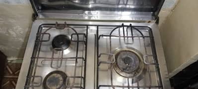 gas stove ,with three top burners ,new only burners are used