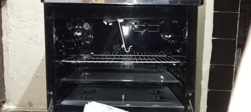 gas stove ,with three top burners ,new only burners are used 1