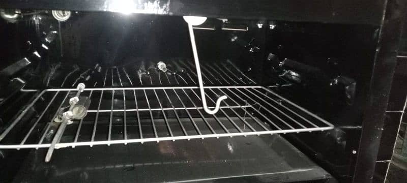 gas stove ,with three top burners ,new only burners are used 2