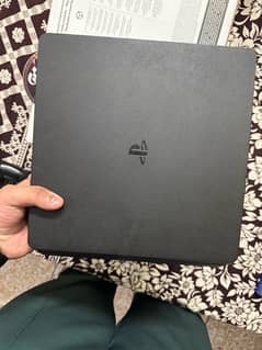 ps4 slim with 2 controllers and games