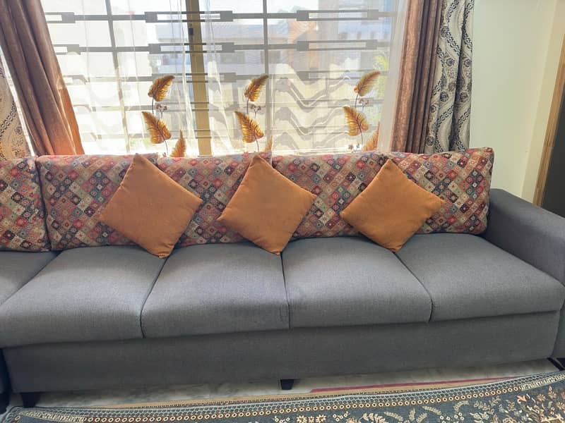 8 Seater L shaped sofa with cushions and cover 0