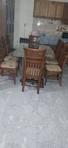 8 dining chairs with table just like new slightly used.