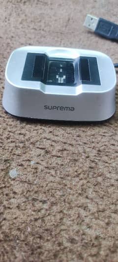 Suprema thumb scanner