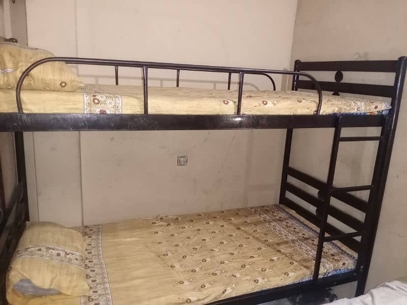 iron bunk bed with mattress 0
