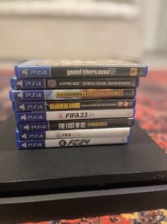 PS4 Slim 500 GB, 1 Controller, and 8 games