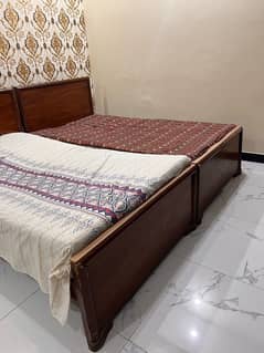 2 Single Wooden Bed