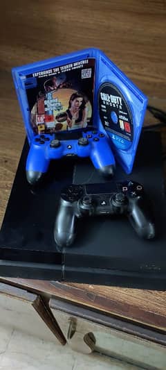 PS4 for sale with 2 controllers and 3 games, Tekken, COD and GTA