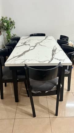 8 seater dining table at only 55000 negotiable