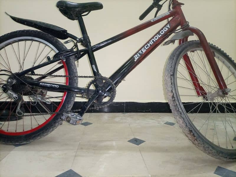 mountain nace bike black and red colour with Shimano gears and lock 0