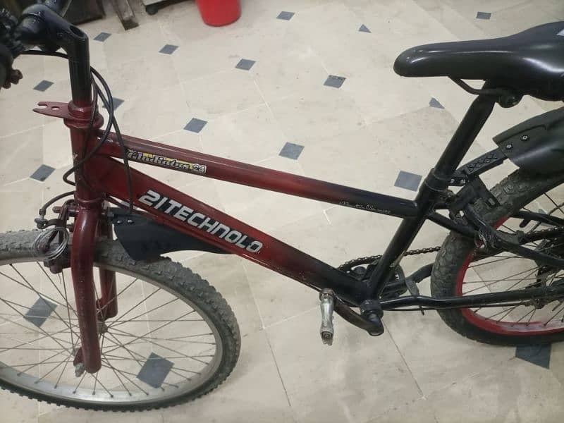 mountain nace bike black and red colour with Shimano gears and lock 1