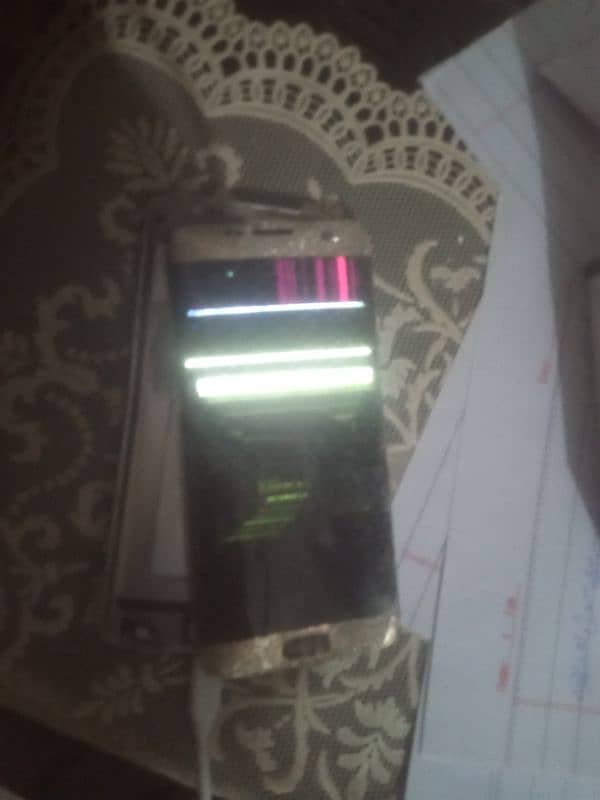 Samsung s 7 edge panel damage and back damage and battery so bad 1